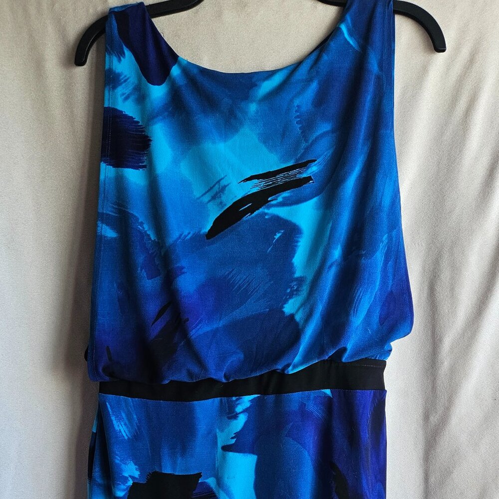 Enfocus Studio size 6, blue and black dress with open back. Small spot on dress.
